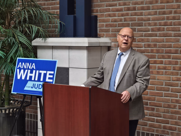 Attorney Robert Hamilton introducing Anna White at judicial campaign announcement